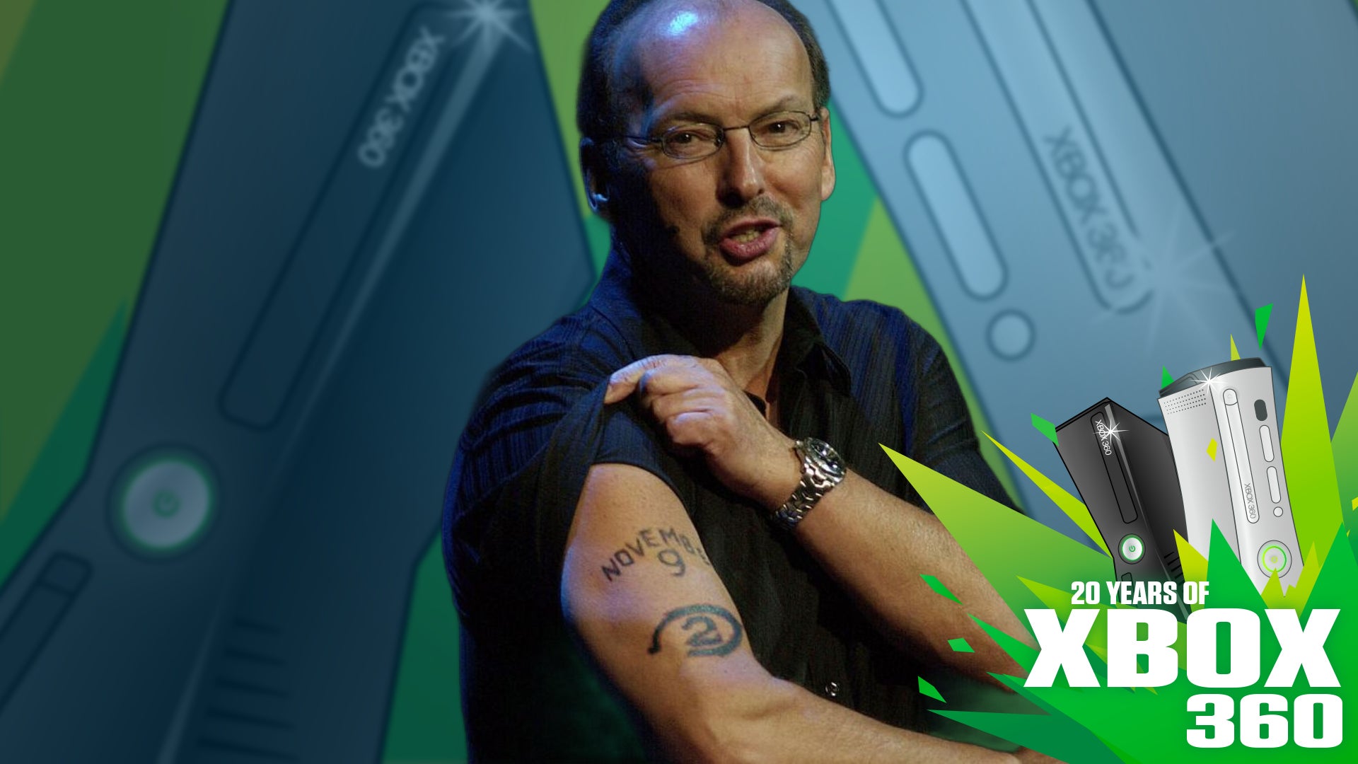 A middle-aged man pulls up his sleeve to reveal a tattoo on his upper arm. It's Microsoft's Peter Moore. He's surrounded by overlaid Xbox 360 imagery and logos.