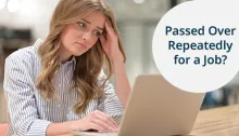 A woman looking stressed and frustrated while working on a laptop, with the text 'Passed Over Repeatedly for a Job?' in a designated area.